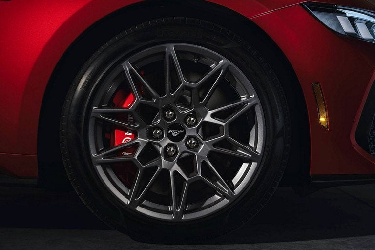 2024 Ford Mustang® model with a close-up of a wheel and brake caliper | Essential Ford of Stuart in Stuart FL